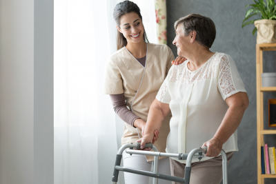 caregiver and senior looking each other