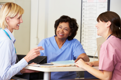 nurses and caregivers talking each other